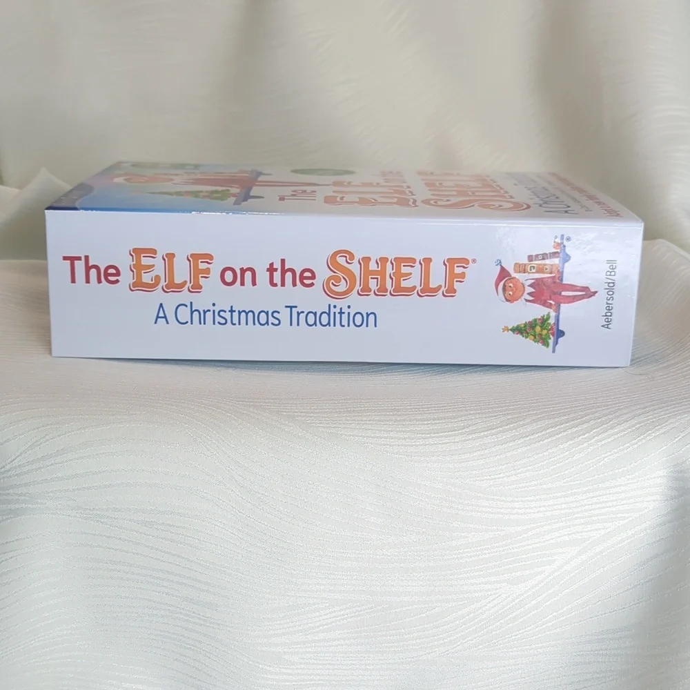The Elf on the Shelf: A Christmas Tradition Illustrated Book & Scout Elf (Boy)